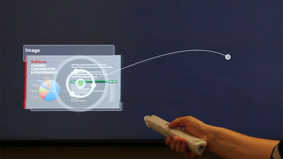 User demonstrating how to move and resize an item on screen with the gestural wand in Mezzanine