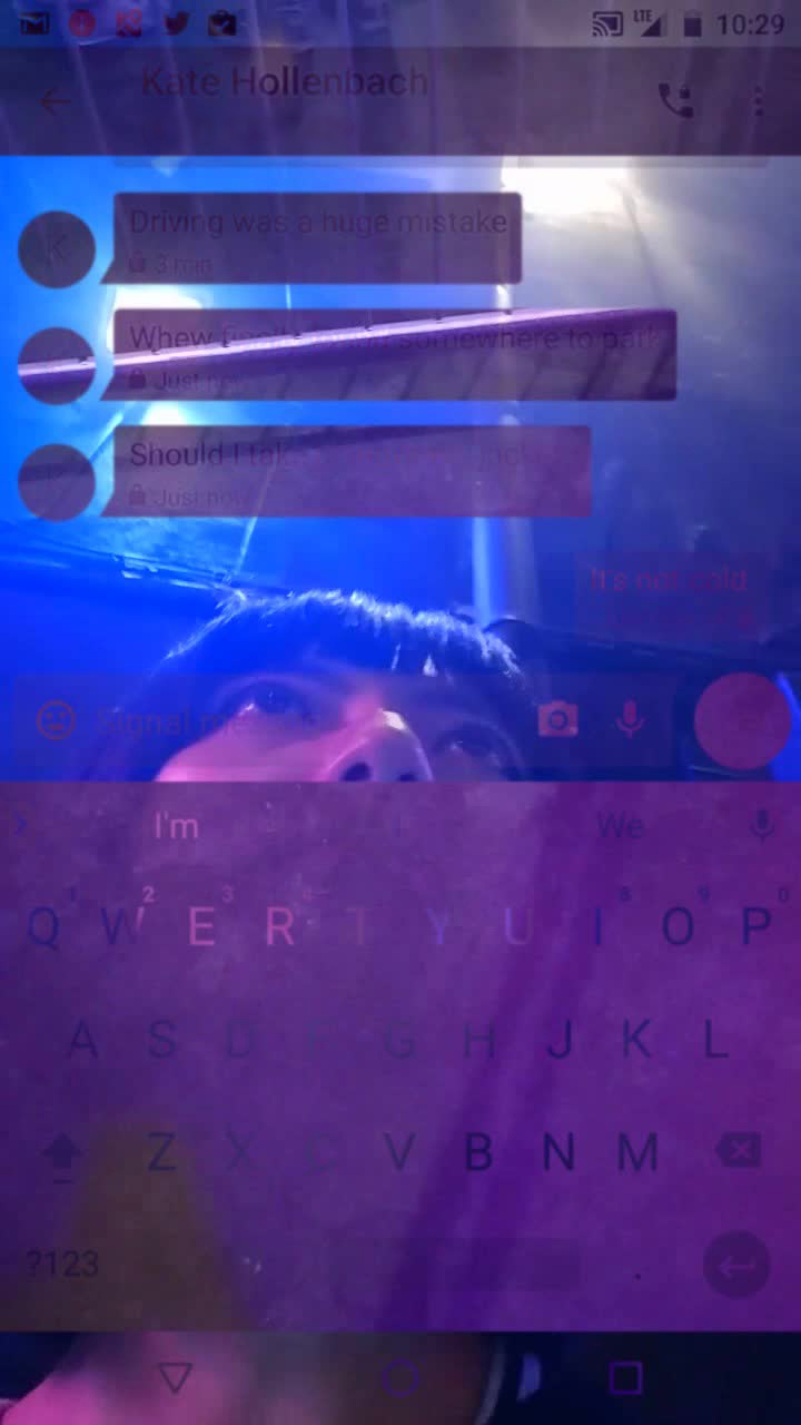 User texts some fashion advice to a friend from a club with vibrant blue and purple lighting, in still frame from user_is_present
